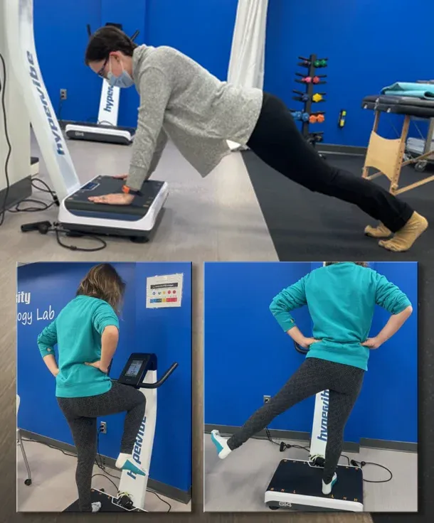 One person holding a plank with their hands on a vibration plate, and another doing single-leg balance exercises on a vibration plate